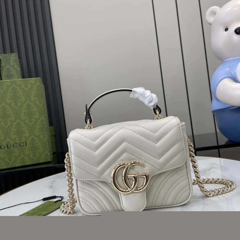 G*u*i top handle bags